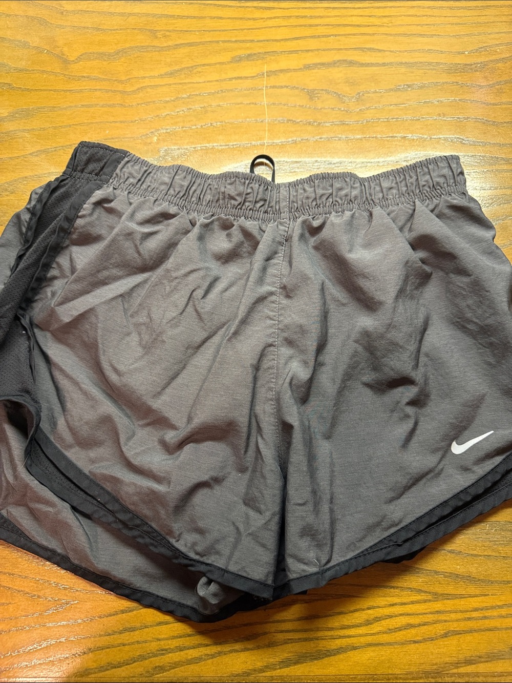 Nike Dark Gray Running Shorts with White Swoosh
